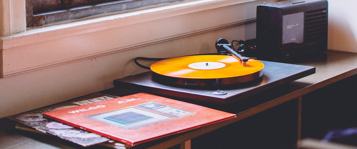 the differences between semi-automatic, automatic, and automatic turntables